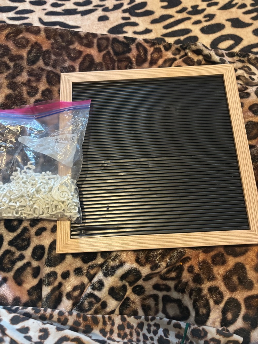 Black Letter Board with Light Wood Frame and White Letters